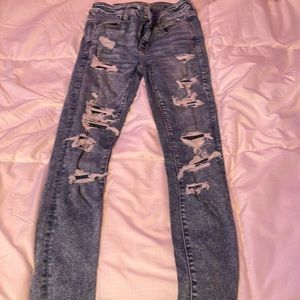 american eagle size 2 ripped jeans with patched back